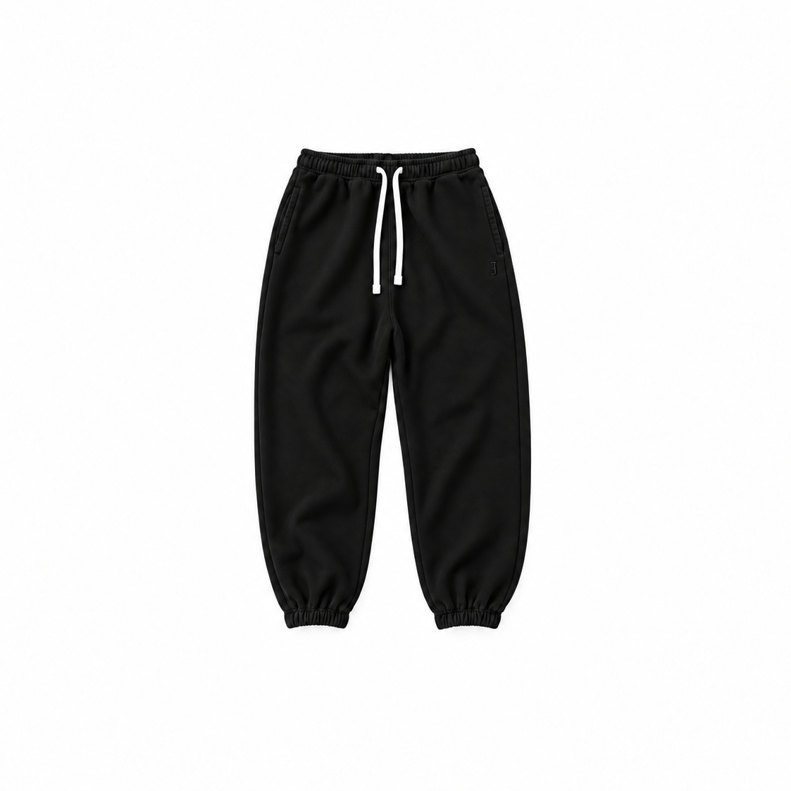 Invicoros Cuffed Joggers in black, 100% cotton French terry, baggy fit with ribbed cuffed hem